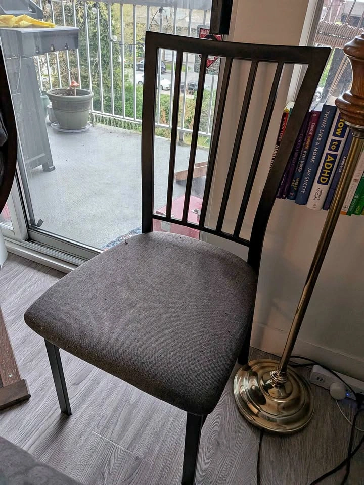 Black metal kitchen chair with gray seat