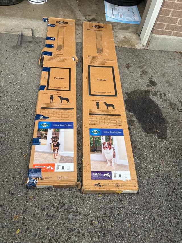 Brand New PetSafe Sliding Glass Pet Doors (2)
