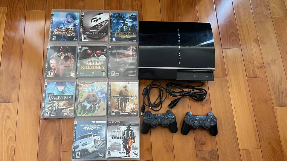 PS3 Console with Games and Controllers