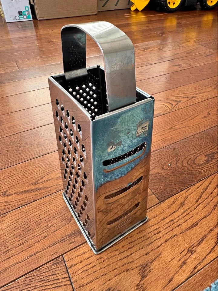 Stainless steel 4-way grater