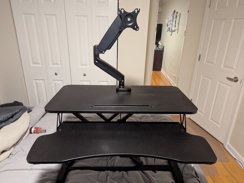 Standup desk + monitor arm bar