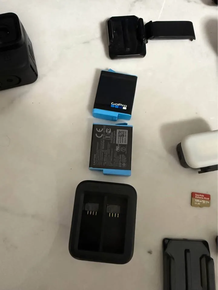 GoPro Hero 10 Black  with hard case and many accessories. image indicator(7)