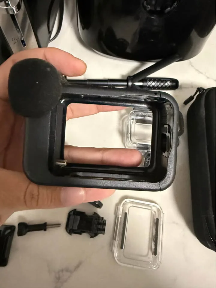 GoPro Hero 10 Black  with hard case and many accessories. image indicator(9)