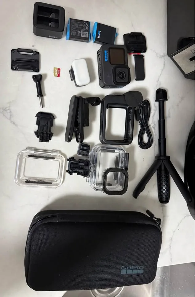 GoPro Hero 10 Black  with hard case and many accessories. image indicator(2)
