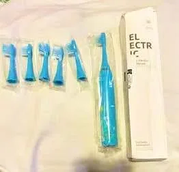 20$ 🦷 Children’s Electric Toothbrush with 6 brushheads image indicator(2)