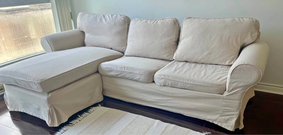 (Must go today)Sectional sofa with chaise and slipcovers