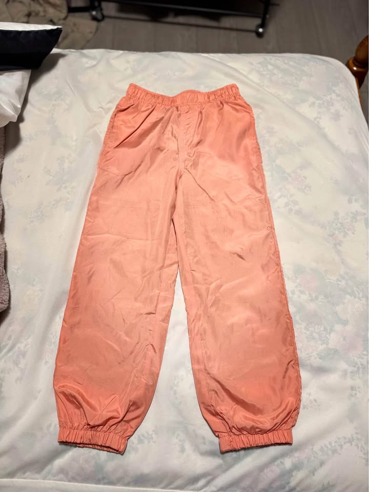 Peach coloured jogger pants Size 6
