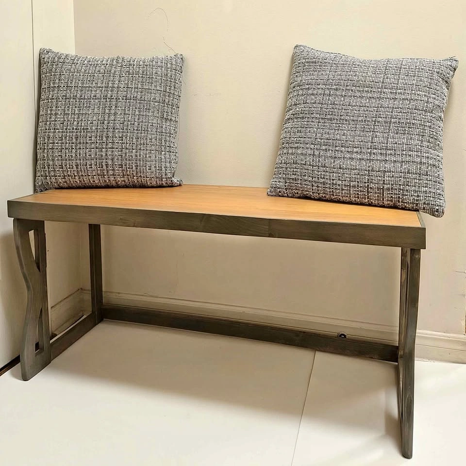 Two-tone wood bench with hand-carved frame