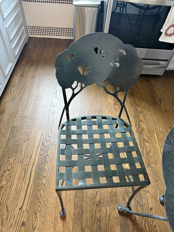 Green metal chair