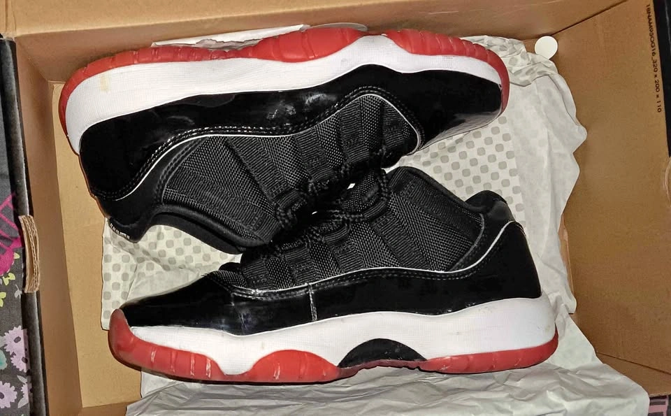 Jordan Low Bred 11s Size 4Y $60