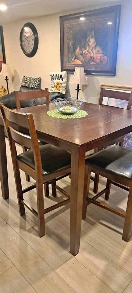 Solid Timber Dining Set with 4 leather seats - $85