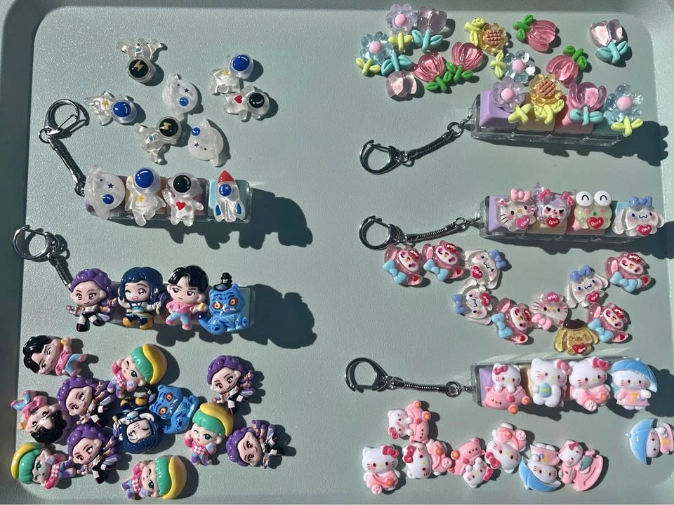 Custom keycaps with hand-glued decorative charms
