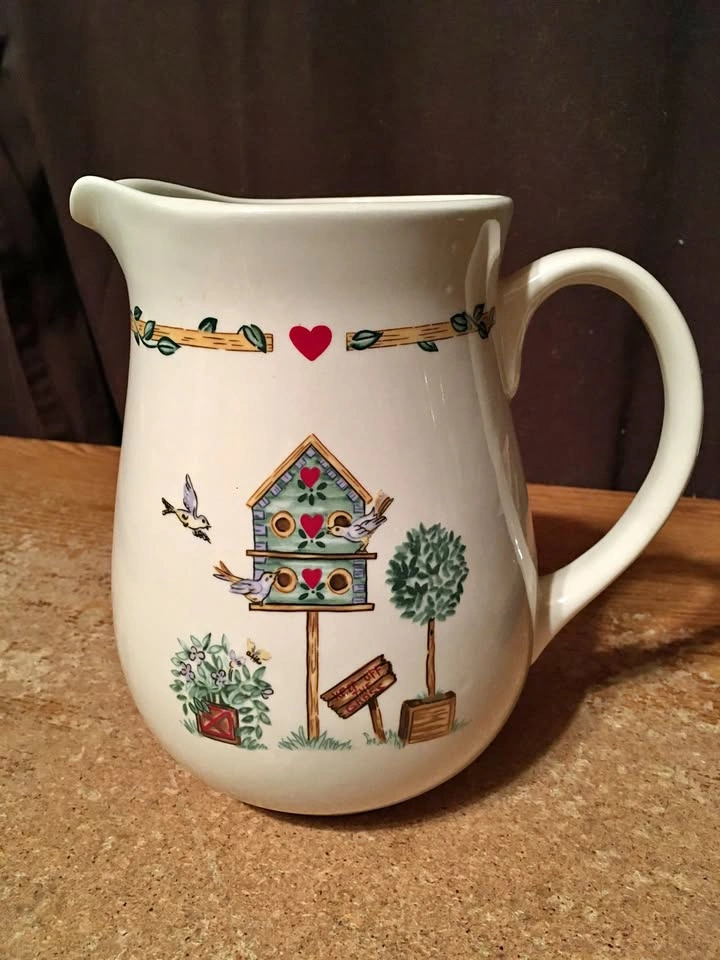 Thomson Pottery Pitcher with Birdhouse Scene