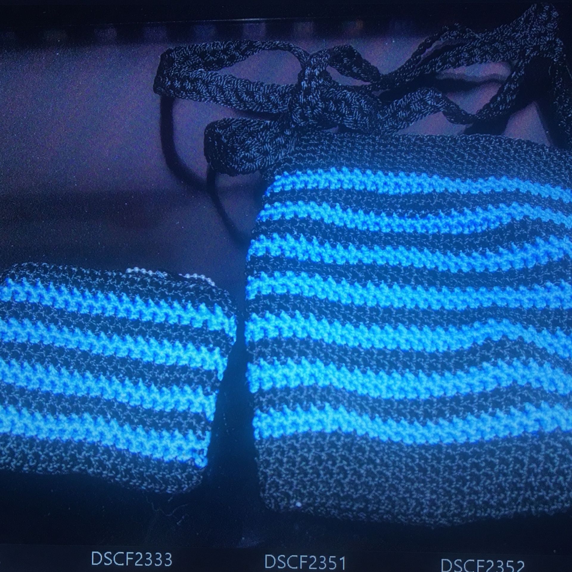 Black and blue crocheted pocket and purse set