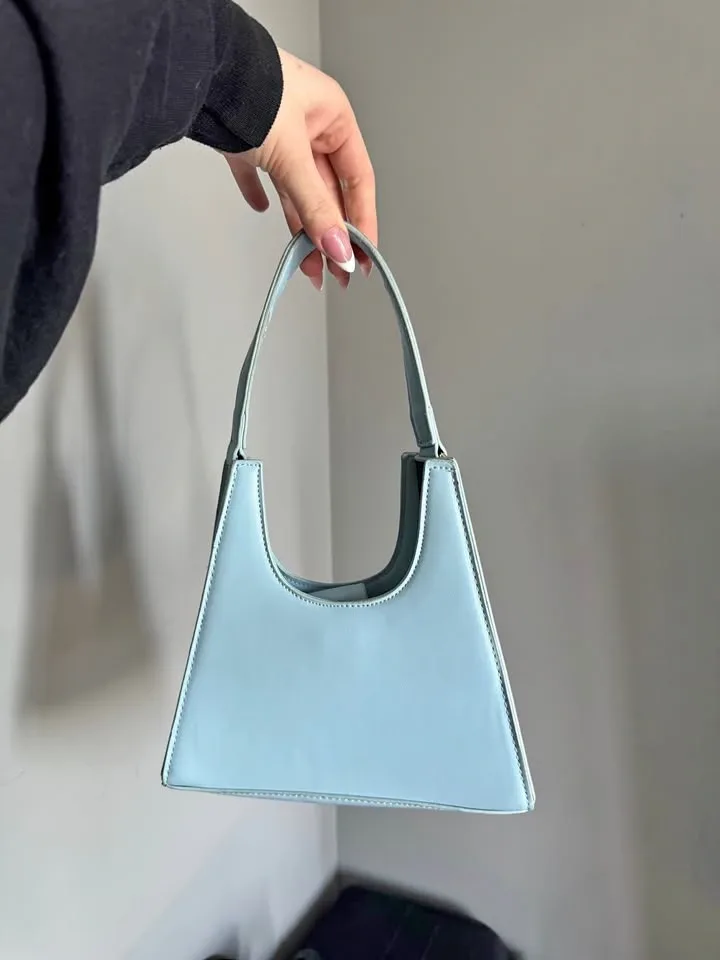Small blue handbag w/ long detachable strap included