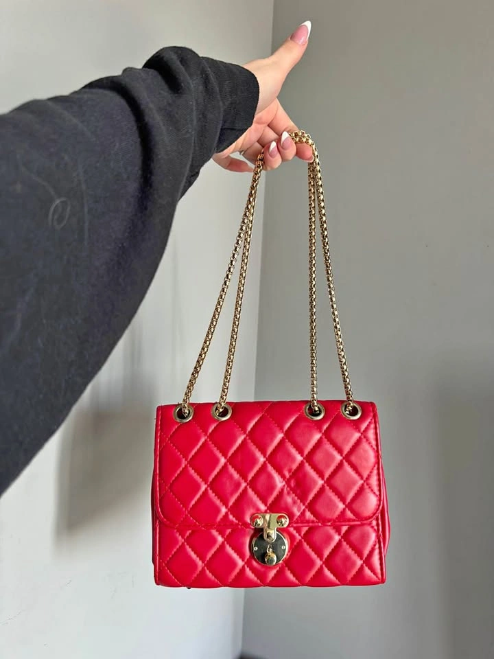 Red handbag with gold accents