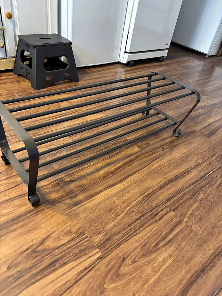 Brown metal shoe rack