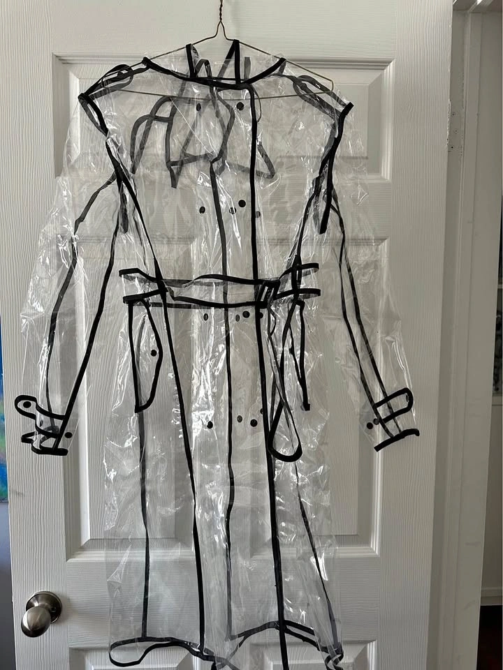 Never worn stylish rain cover
