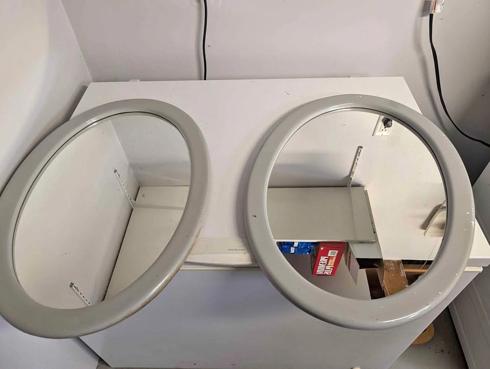 2 Oval Mirrors