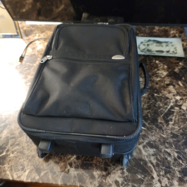 Black travel case suitcase bag luggage rolling