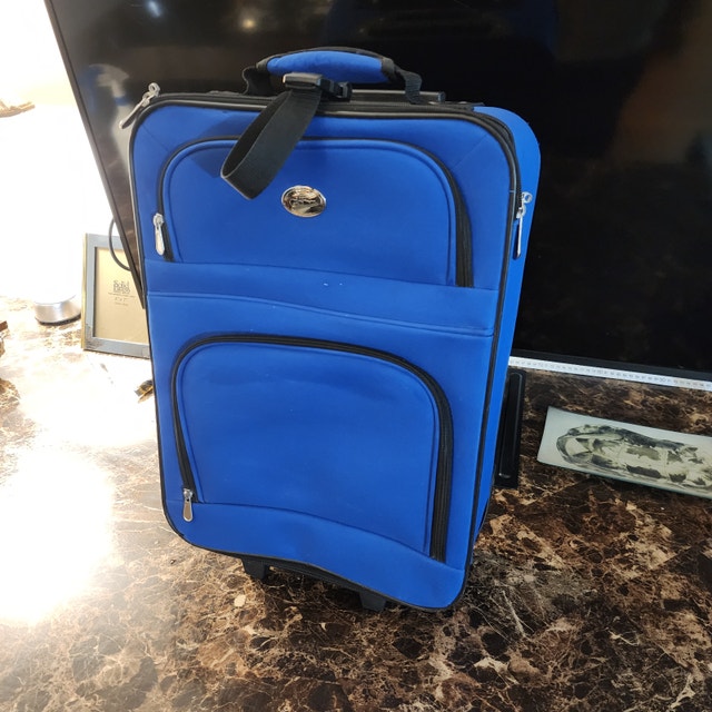 Blue travel case suitcase bag luggage rolling