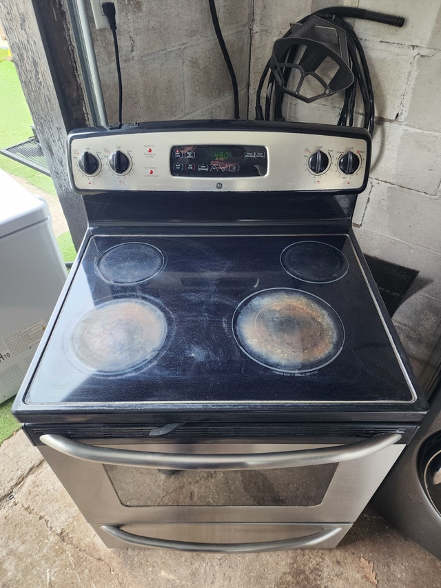 GE Black Stainless Steel Electric Stove - photo 2