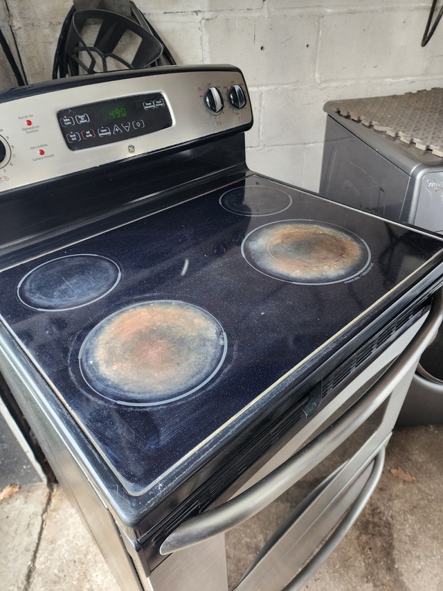 GE Black Stainless Steel Electric Stove - photo 3