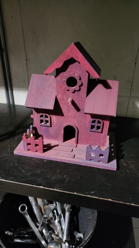Red bird house decor outside bird home