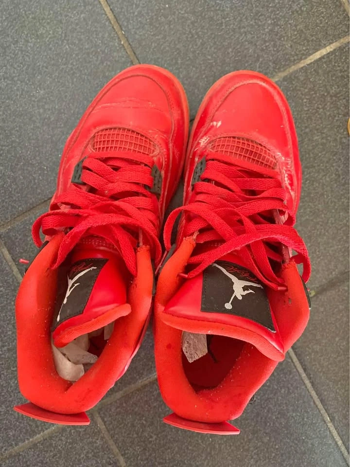 Jordan 4 Red Singles Day