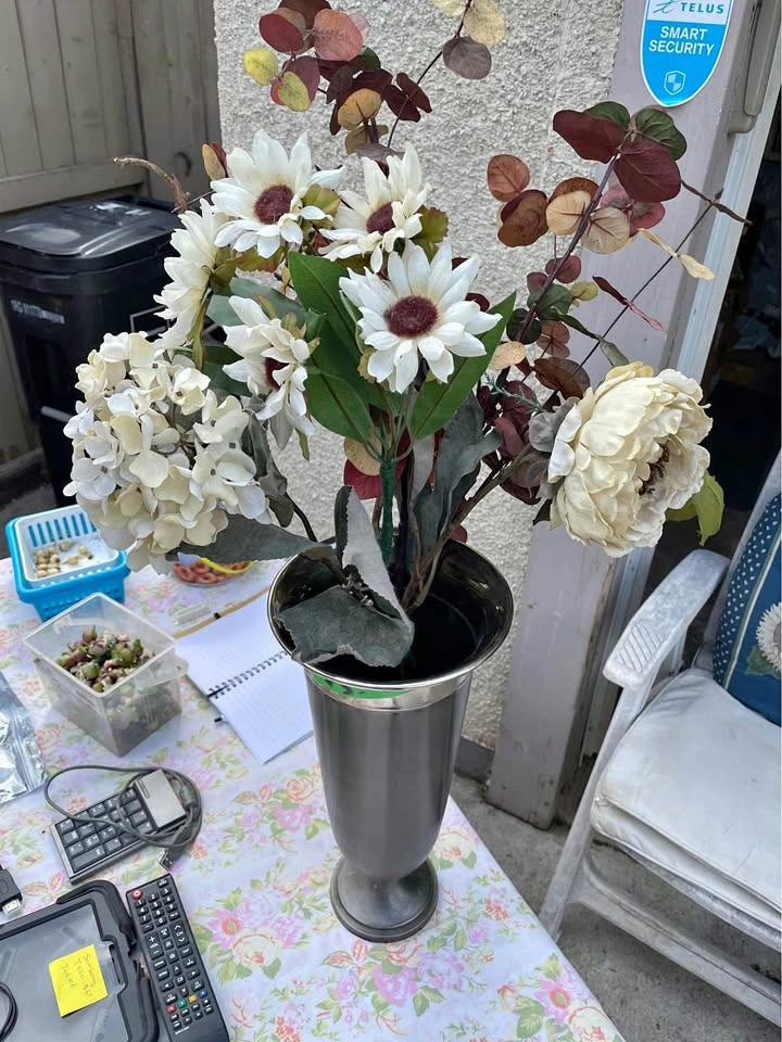 Metal flower vase with flower