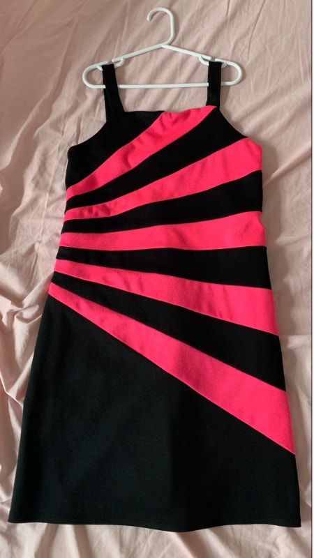 Girls dress in black and pink. Size XL $10.