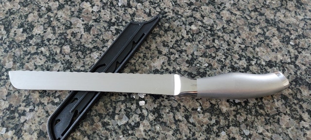 Stainless steel bread knife in great condition. $20