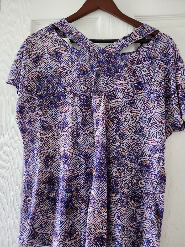 Purple crossed back top. Fair condition. Size 2X. $5.