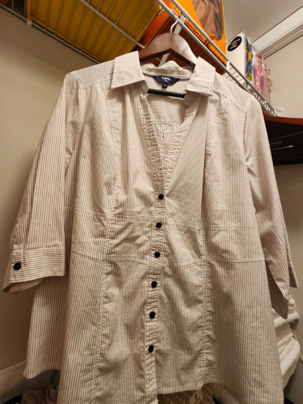 White blouse with black stripes. 3/4 sleeves. Size 18. $20.