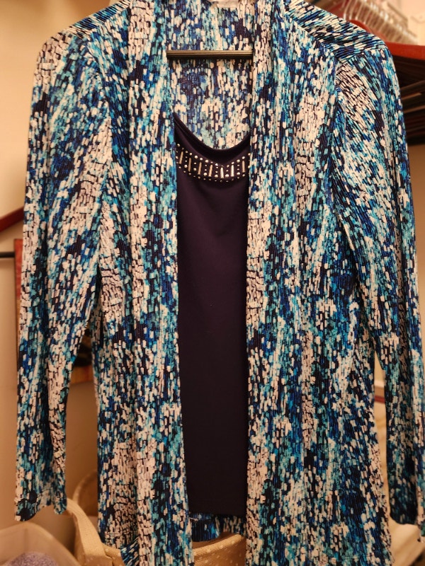 Long sleeve blouse, size 16. Like new. $25