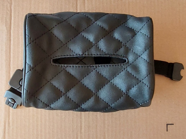 In car tissue box. $2.