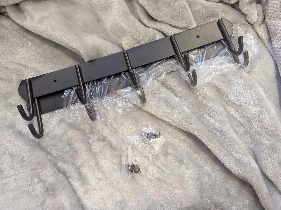 Wall mounted hooks x2