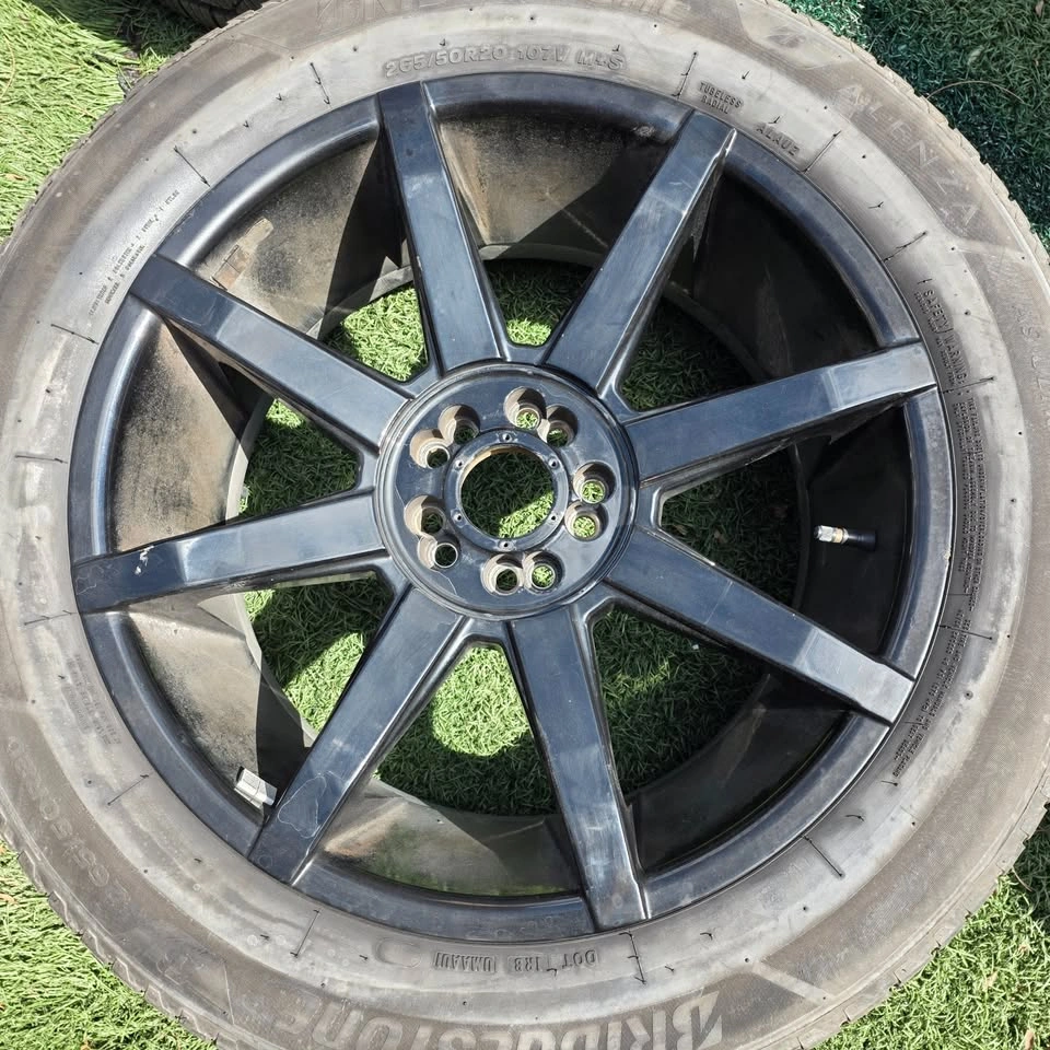 265/50/20 Bridgestone All Season Tires w/ Black Alloy Rims - photo 2