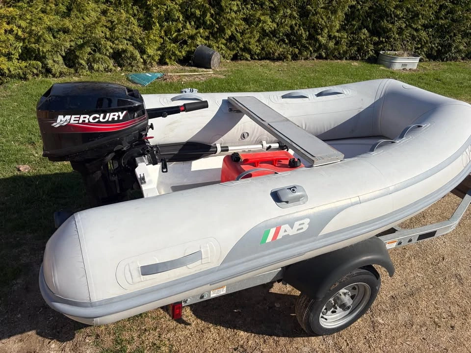 AB Inflatable Boat/Mercury 9.9 Engine/Trailer