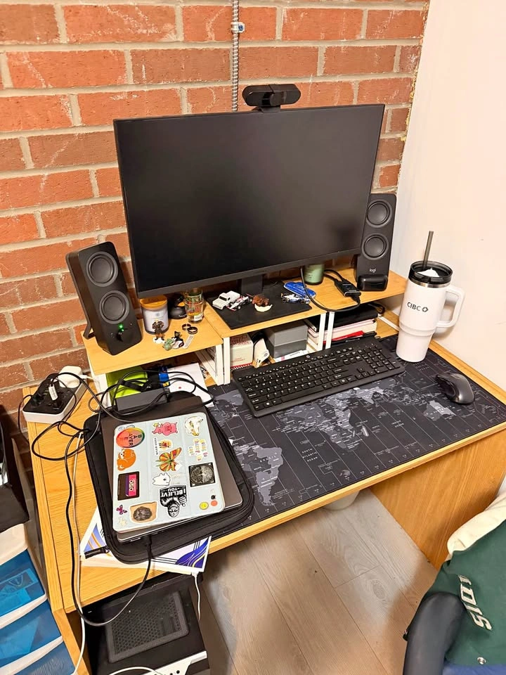 Functional wooden desk. Light wood color. Simple design. Plenty