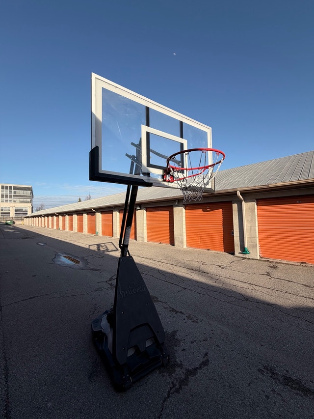 Spalding 60” Acrylic Hybrid Portable Basketball Hoop - photo 3