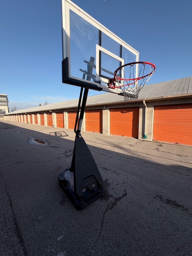 Spalding 60” Acrylic Hybrid Portable Basketball Hoop - photo 5