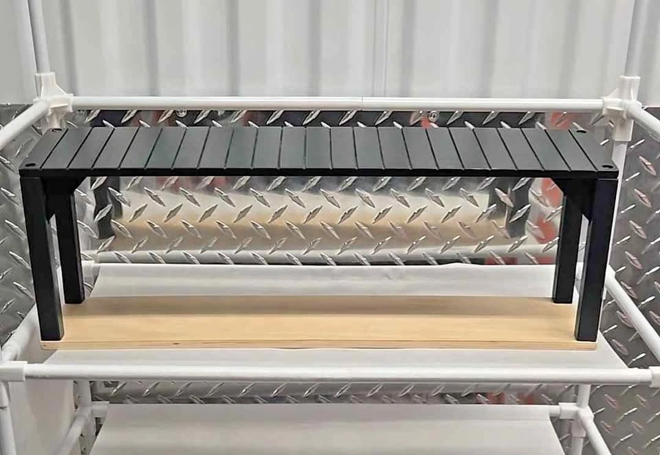 Black slatted display stand