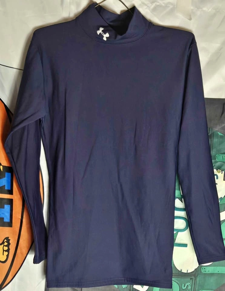 Men's Under Armour blue mock long sleeve shirt. Medium. $20