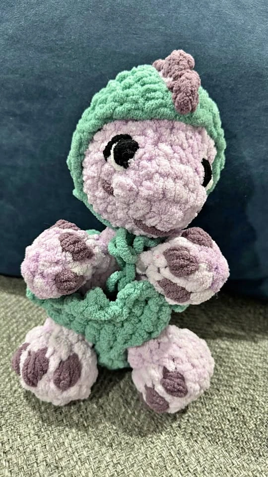 Crochet baby dinosaur in egg