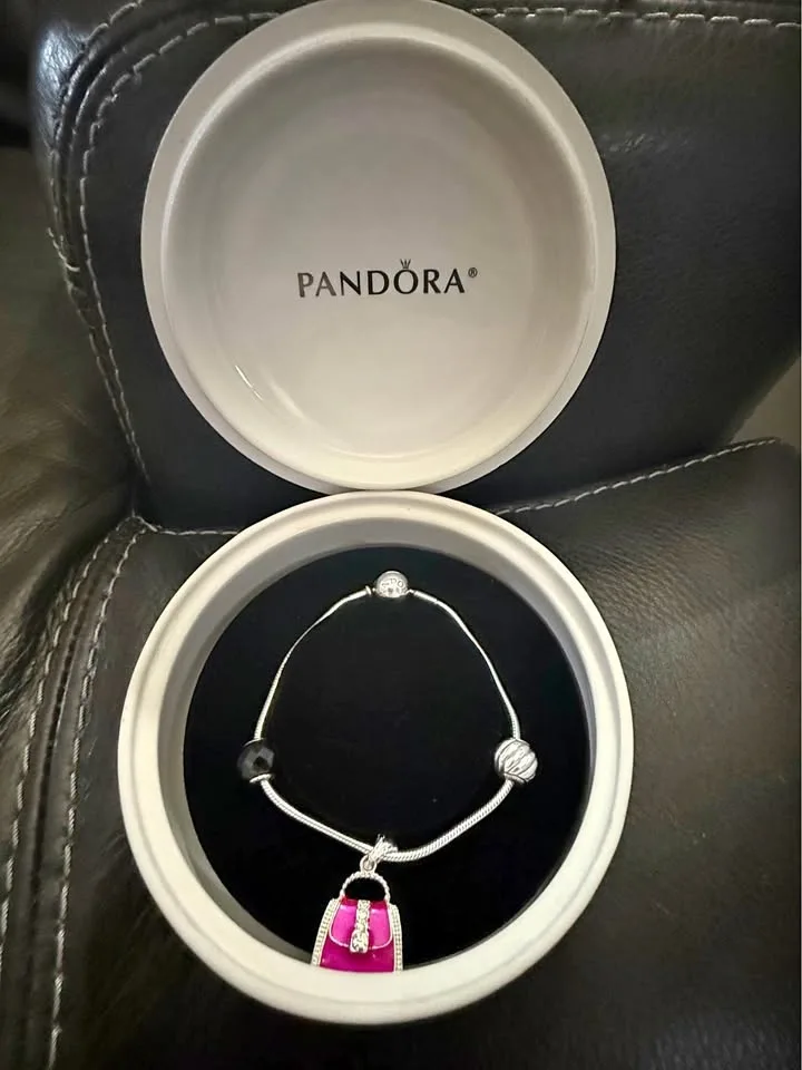 Pandora bracelet with charms and trinket