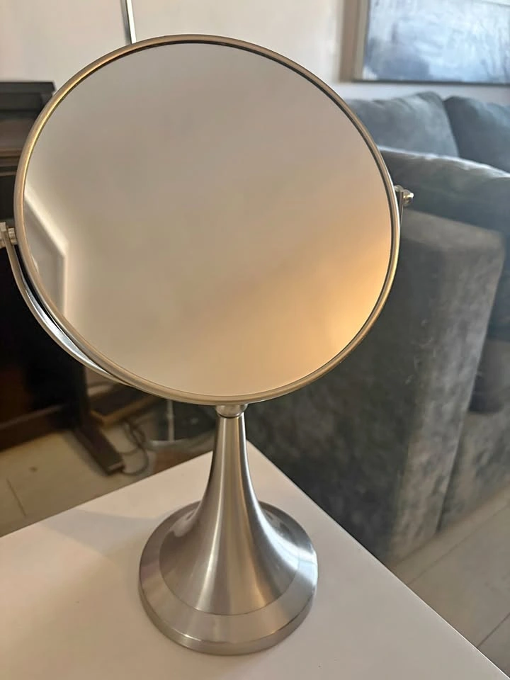 Two sided make-up mirror