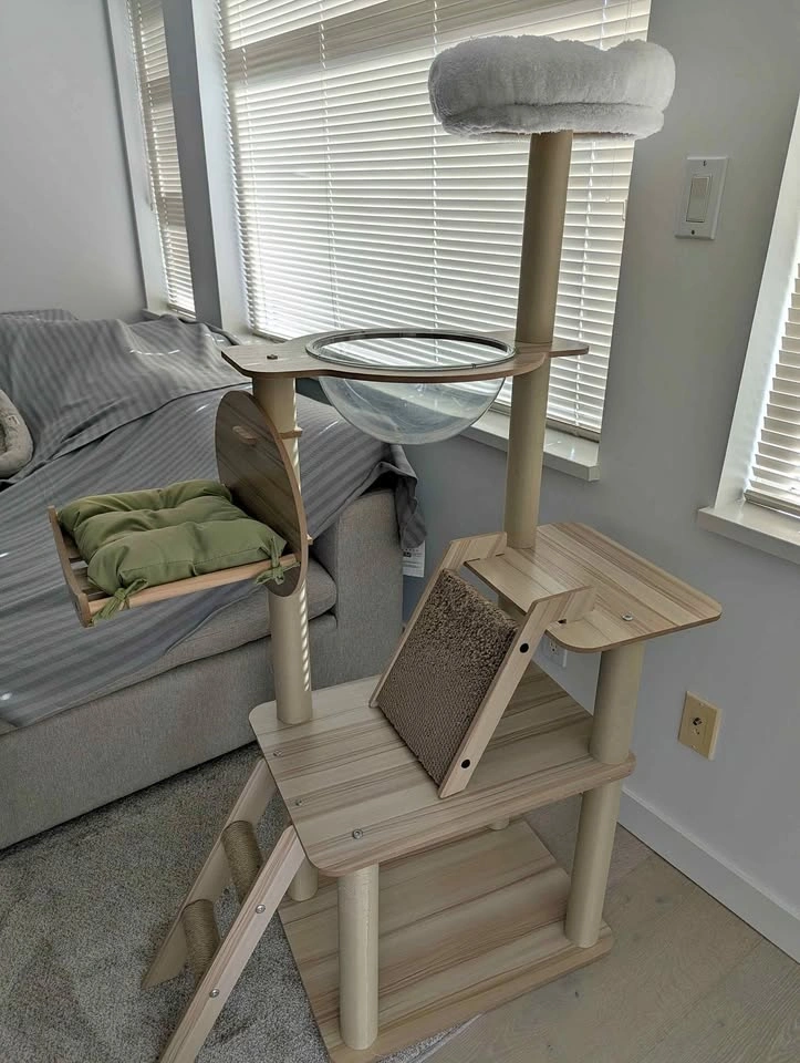 Tan wood cat tree