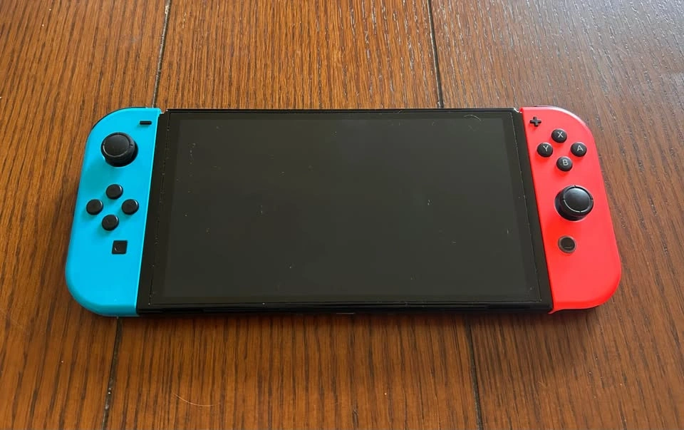 Nintendo Switch OLED + 2 Games - photo 2