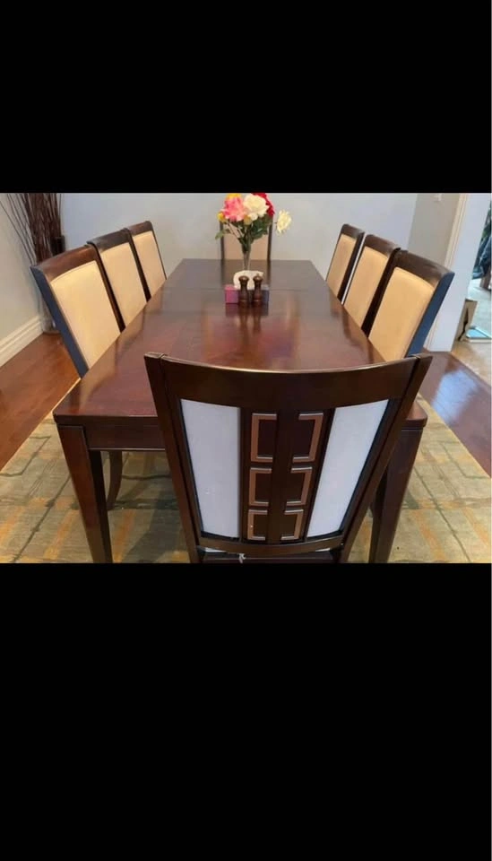 Wooden dining table with 8 chairs